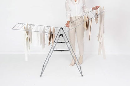 Brabantia HangOn Clothes Drying Rack | 82ft (25m) | Metallic Gray | Large Indoor Clothes Airer Laundry Stand with 2 Fold-Out Wings & Hanger Hooks, Folds Flat | Fits 2 Full Loads