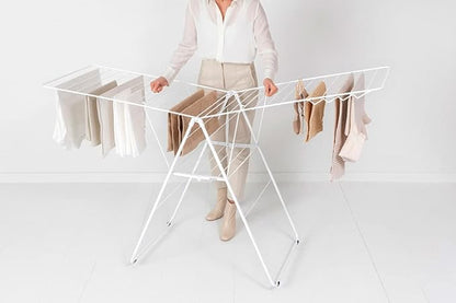 Brabantia HangOn Clothes Drying Rack | 82ft (25m) | White | Large Indoor Clothes Airer Laundry Stand with 2 Fold-Out Wings & Hanger Hooks, Folds Flat | Fits 2 Full Loads