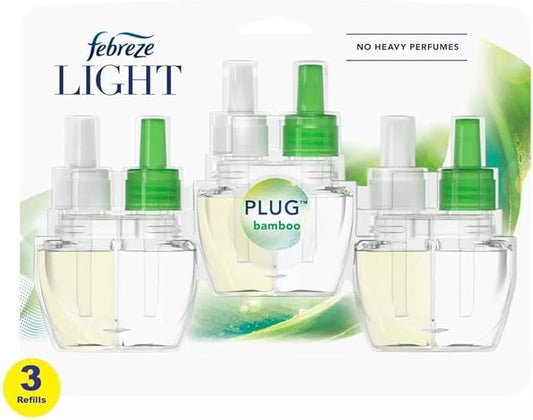 Febreze Plug with Fade Defy Technology Air Freshener - New Limited Edition - (3) of 0.87 fl oz Refills (Bamboo Bambou)