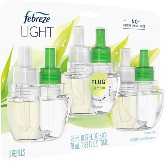 Febreze Plug with Fade Defy Technology Air Freshener - New Limited Edition - (3) of 0.87 fl oz Refills (Bamboo Bambou)
