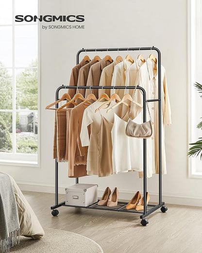 SONGMICS Double Rods Clothes Rack with Wheels, Clothing Rack for Hanging Clothes, Heavy Duty Garment Rack with Mesh Storage Shelf, 2 Brakes, Each Top Rail Holds up to 77 lb, Black UHSR26BKV1